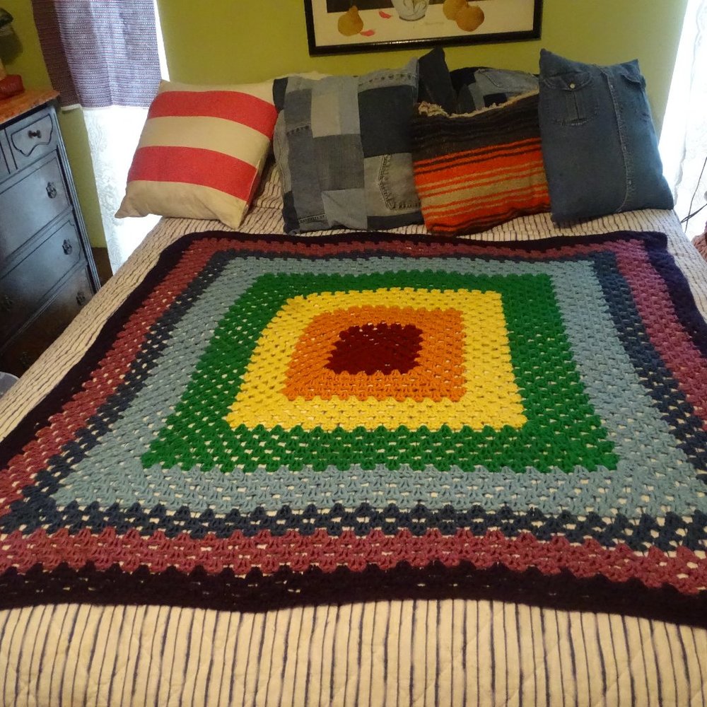 Afghan crocheted, multi-colored, sz 50" x 48" purple, blue, green and more